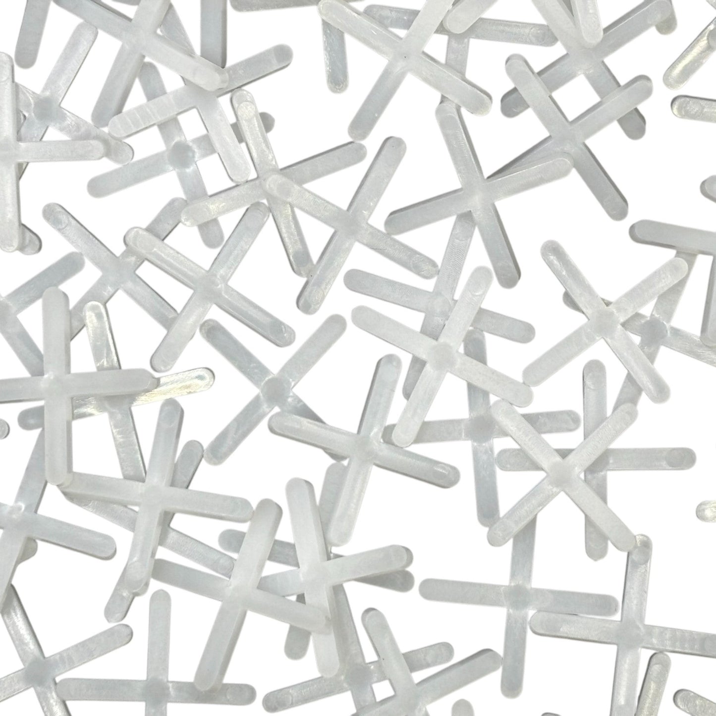 Set of 100 DIY Simple LTD X-shaped 3mm tile spacers for tiling projects, ensuring even grout lines and professional results.